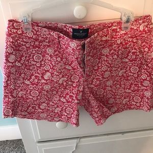 White and pink American eagle shorts